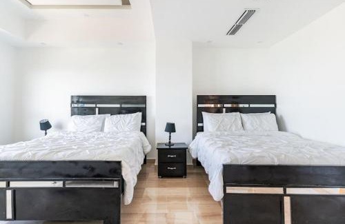 San Geronimo Apartment | Ocean View 2BDR Retreat with Pool & Breakfast Included
