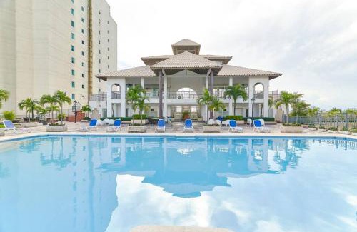 San Geronimo Apartment | Ocean View 2BDR Retreat with Pool & Breakfast Included