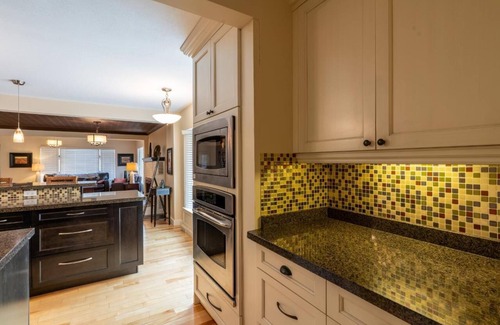 East Kootenay House | Elegant 5-Bedroom Oasis with Private Pool Steps from Beach
