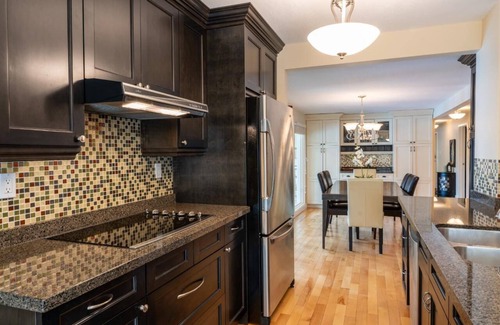 East Kootenay House | Elegant 5-Bedroom Oasis with Private Pool Steps from Beach