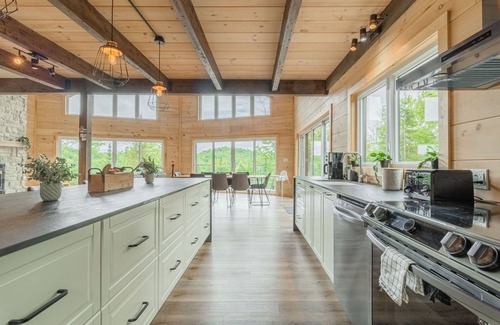 Chertsey Ski Chalet | Exceptional 5BR Wood Chalet with Spa and Family Amenities