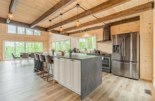 Chertsey Ski Chalet | Exceptional 5BR Wood Chalet with Spa and Family Amenities