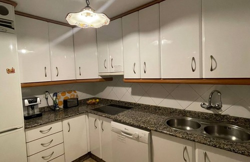 Velilla-Taramay Condo | Sea View Apartment with Pool, WiFi & Bikes for 6 Guests