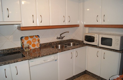 Velilla-Taramay Condo | Sea View Apartment with Pool, WiFi & Bikes for 6 Guests