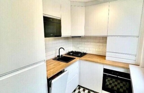 Katowice Apartment | Stylish BOHO Apartment with Home Office & Child-Friendly Amenities