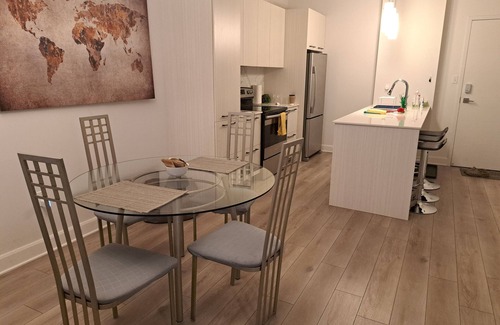Laval Condo | Elevated Condo with Pool, Gym & Rooftop Terraces