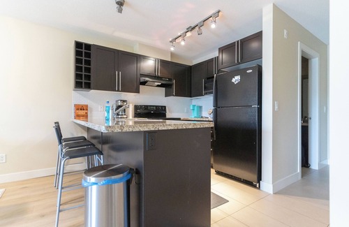 Central Okanagan Condo | Serene Downtown Oasis Steps from the Lake with Pool