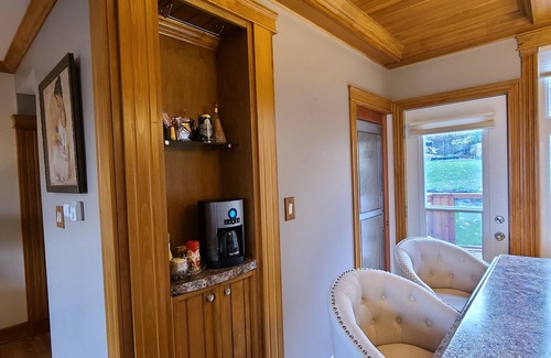 West End Apartment | Elegant Retreat with Water Views, Pool and Spa Amenities