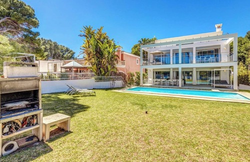 Alcudia House | Elegant Gemelos Holiday Home with Pool & Oceanfront Views
