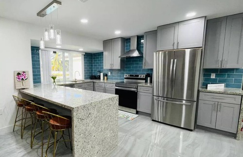 Miramar House | Serene Lake View Villa with Pool and Gaming Amenities
