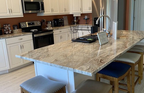 Buford House | Modern Retreat with Pool & Hot Tub for Families and Business