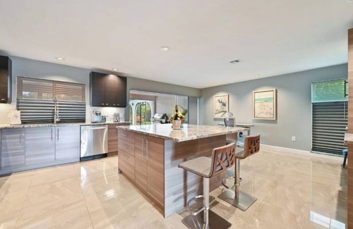 Palm River Estates House | Exceptional Naples Retreat with Heated Pool, Steps to Beach