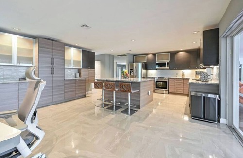Palm River Estates House | Exceptional Naples Retreat with Heated Pool, Steps to Beach