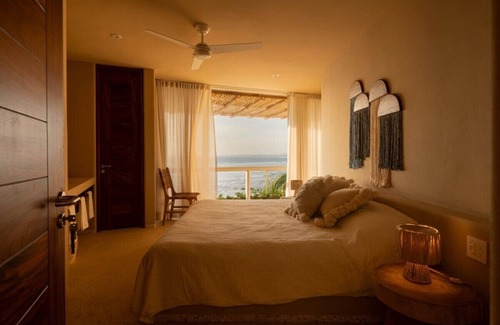 Saladita Villa | Beachfront PH with Private Pool & Spa Amenities Await