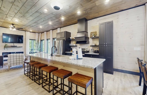 Sevierville Cabin | Luxurious Pool Cabin w/theater room, game room, hot tub, decks, grill, and WiFi