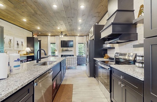 Sevierville Cabin | Luxurious Pool Cabin w/theater room, game room, hot tub, decks, grill, and WiFi