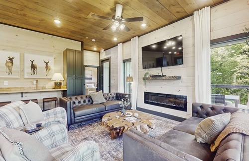 Sevierville Cabin | Luxurious Pool Cabin w/theater room, game room, hot tub, decks, grill, and WiFi