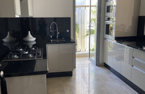 Allyene Apartment | Elegant Ritz Carlton Tamuda Bay Apartment with Ocean Views