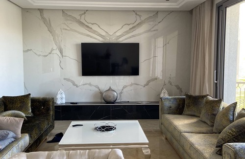 Allyene Apartment | Elegant Ritz Carlton Tamuda Bay Apartment with Ocean Views