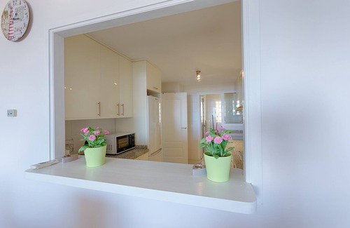 Manilva Apartment | Gorgeous Oceanfront Apartment with 5 Pools & Spa Access