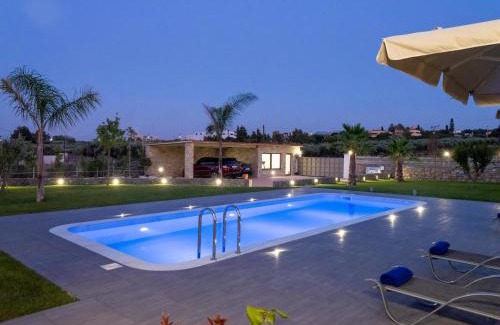 Malevizi Villa | Elegant Villa David: Oceanfront Bliss with Pool Access