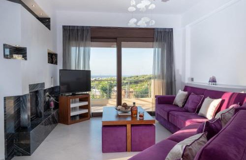 Malevizi Villa | Elegant Villa David: Oceanfront Bliss with Pool Access