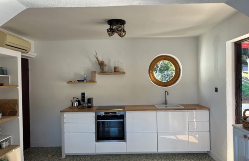 Cove Rogacic House | Luxuriously renovated, waterfront home with private garden.