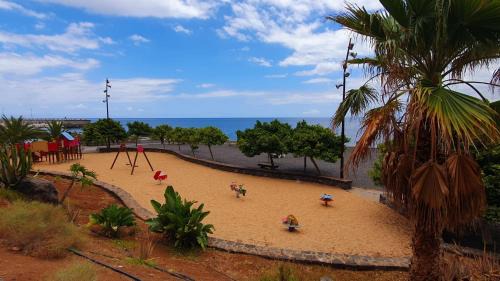 Tabaiba Apartment | Beachfront Retreat with Natural Salt Pool & 10/10 Reviews