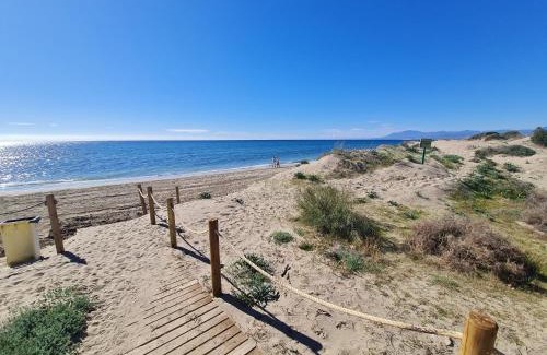 Elviria Apartment | Stylish Penthouse with Pool, Steps from the Beach