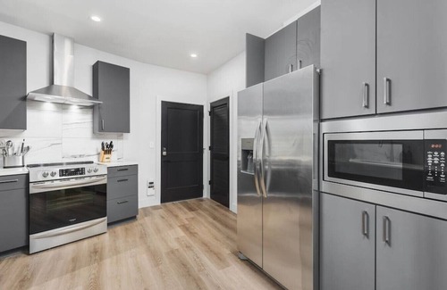 West End Apartment | Exceptional 2 Bedroom Retreat with Wrap Around Patio & Pool
