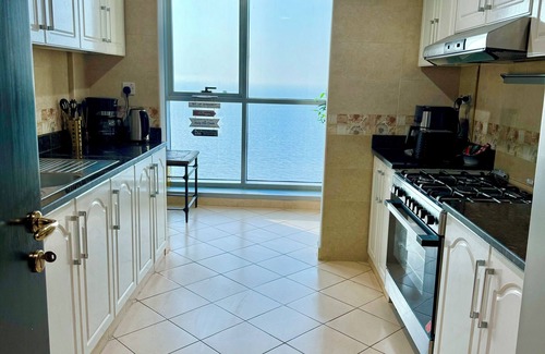 Rumailah Apartment | Luxury 2 bedrooms front beach sea view amazing WiFi, gym, pool, sauna, hammam