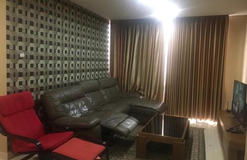 Karet Apartment | Elegant 2 BR Suite at The Grove with Pool & Dining Options
