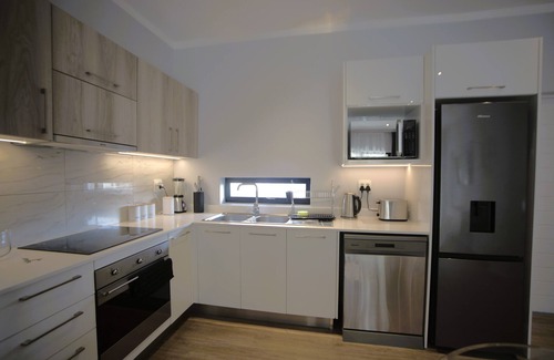 Greater Johannesburg Metropolitan Area Apartment | Stylish 2BR/2BA Retreat in The Monroe, Perfect for Families