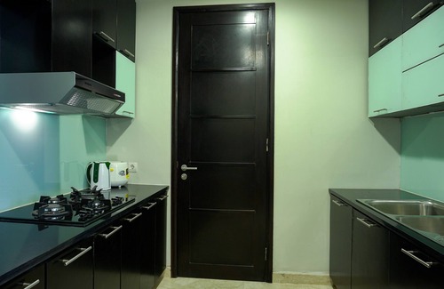 Karet Condo | Elegant 2BR Apartment at The Empyreal Condominium