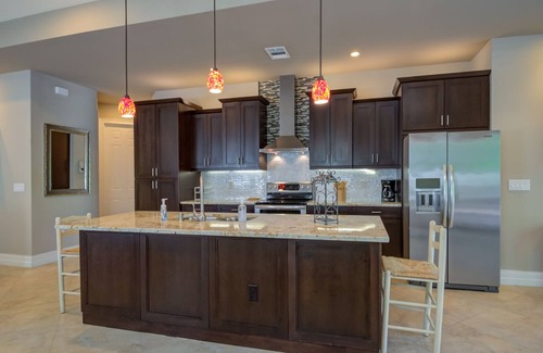 Naples Park House | Exceptional 3 Bedroom Retreat with Ocean View & Heated Pool