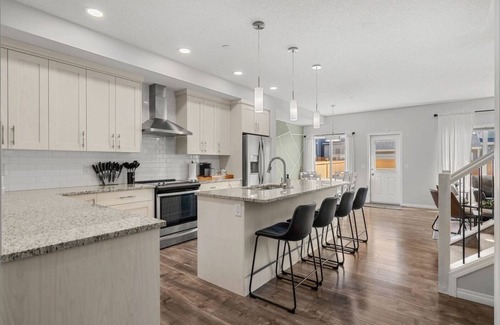 Northwest Calgary House | Spacious Home with BBQ, Hot Tub & Garage Parking