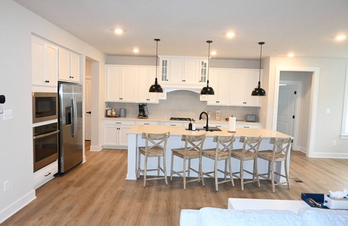 Bayside House | Experience Waterfront Bliss with Indoor-Outdoor Pool