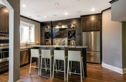 Plymouth House | Premium Home Theater Retreat with Pool & Breakfast Included