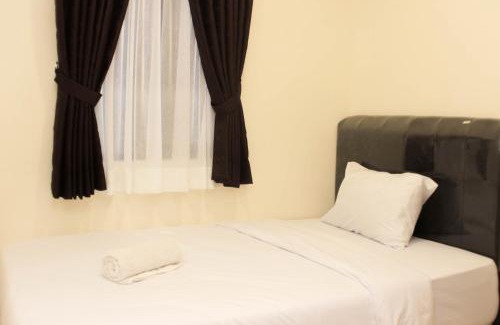 Cikarang Apartment | Cozy 2BR Retreat at Meikarta Apartment by Travelio