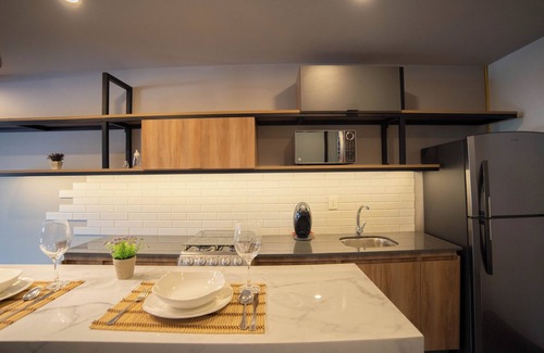 San Andres Cholula Apartment | Stylish Loft in Missum with Spa and Family Amenities