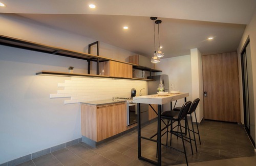 San Andres Cholula Apartment | Stylish Loft in Missum with Spa and Family Amenities