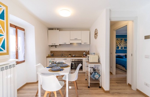 Baveno Apartment | Elegant Apartment Steps from the Lake with Breakfast Included