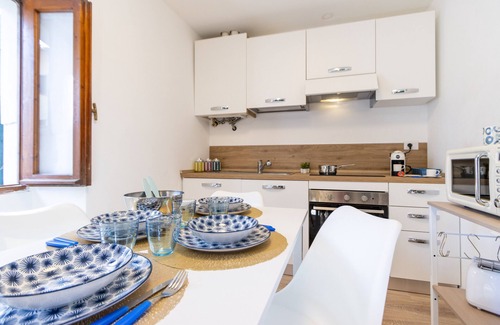 Baveno Apartment | Elegant Apartment Steps from the Lake with Breakfast Included