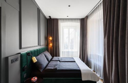 Trieste City Centre Apartment | Elegant Apartment with Terrace Overlooking Piazza Oberdan