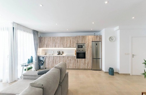 Competa Apartment | Mountain View Apartment with Garden, Pool & Spa Amenities