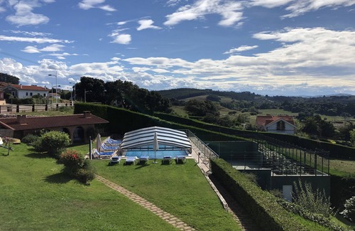 Mogro Apartment | Elegant Oceanfront Apartment with Pool & Tennis Court