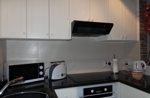 Peyia Town Apartment | Seaview Sunset Apartment with Pool and Free Wi-Fi