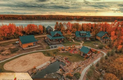 Fowler Lake Ski Chalet | Indulge in Lakefront Luxury with Inviting Hot Tub Retreat