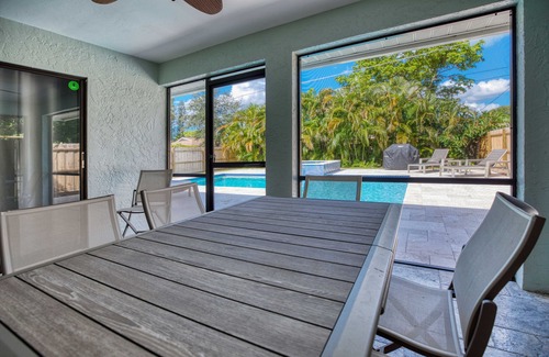 Naples Park House | Beachfront Cottage in Naples with Heated Pool & Hot Tub