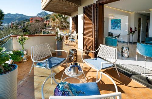 Mazzeo Apartment | Stylish Beachfront Apartment in Taormina with Pool Access